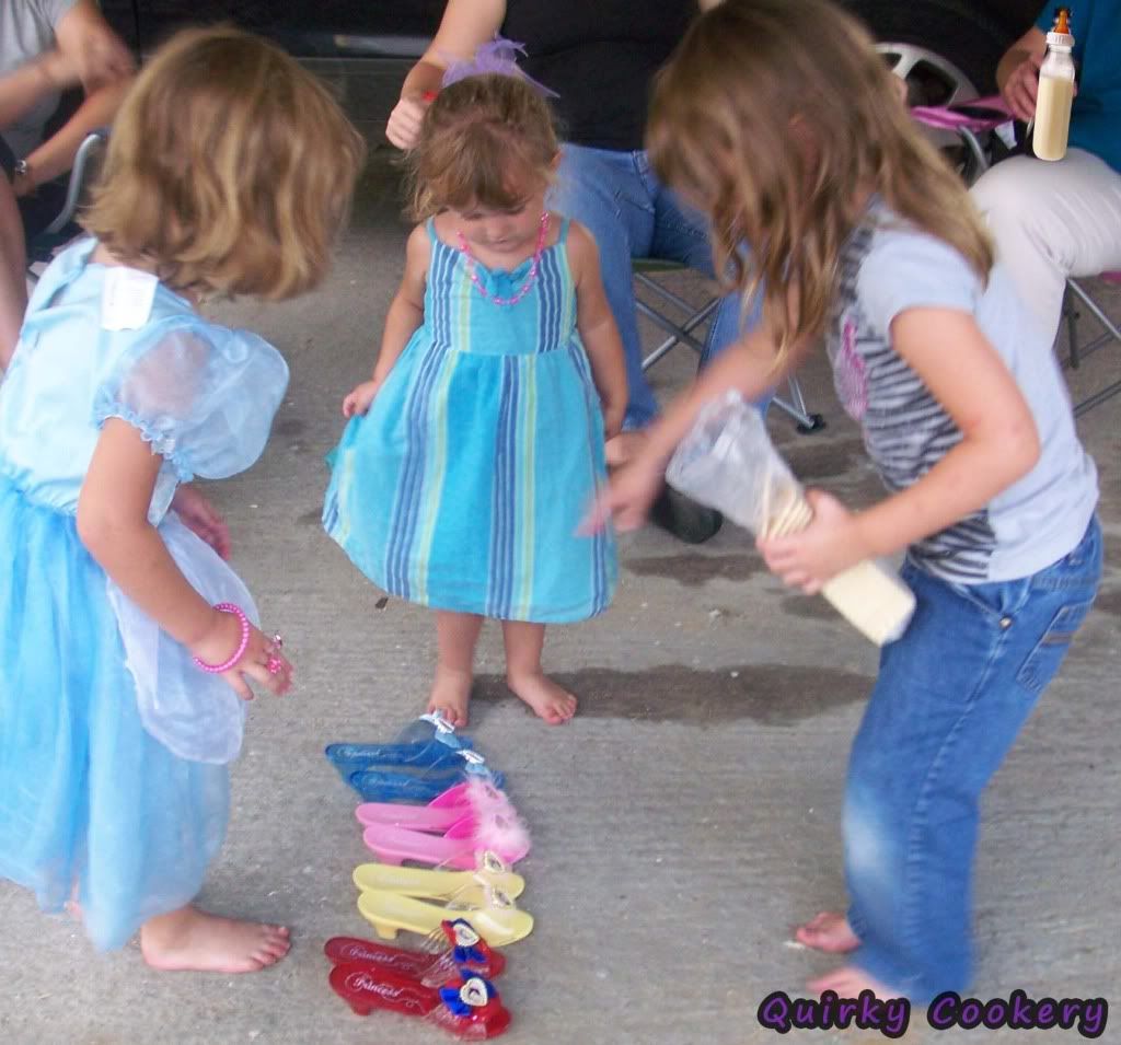 Little girls deciding over who gets which pair of shoes