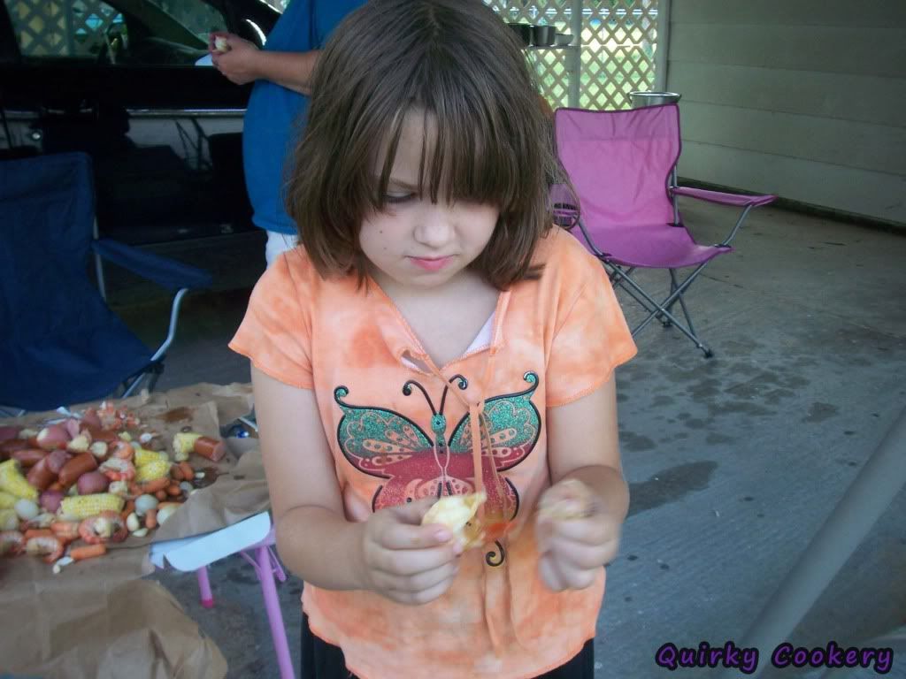 Child (N) peeling shrimp