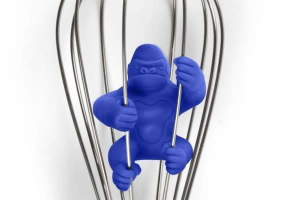 Plastic silicone gorilla monkey figure that looks like King Kong inside a whisk