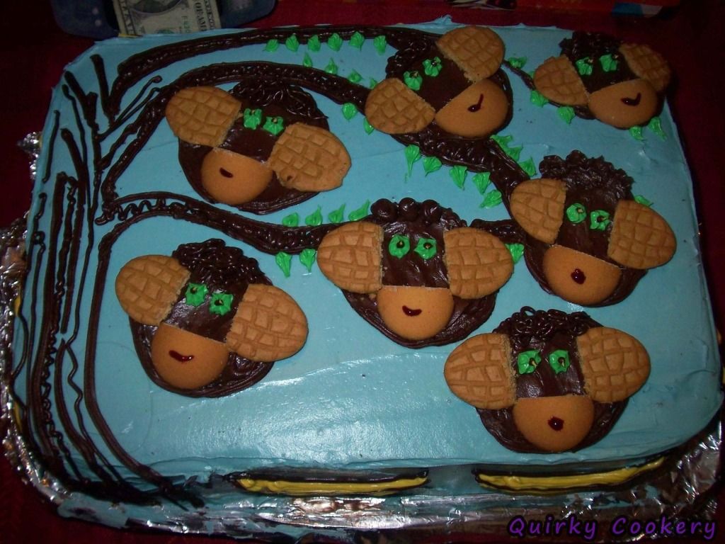 Monkey cake with nutter butters, vanilla wafers, chocolate icing and faces drawn on
