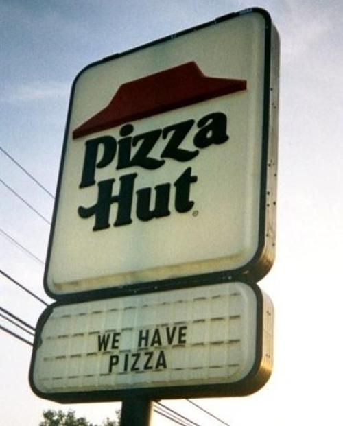 Pizza Hut sign that says "we have pizza" 