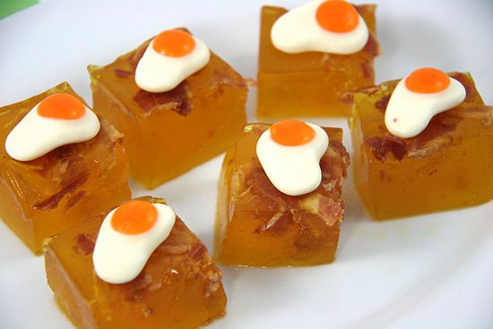 Bacon and eggs jello shots with bacon flavored vodka and gummy egg candies