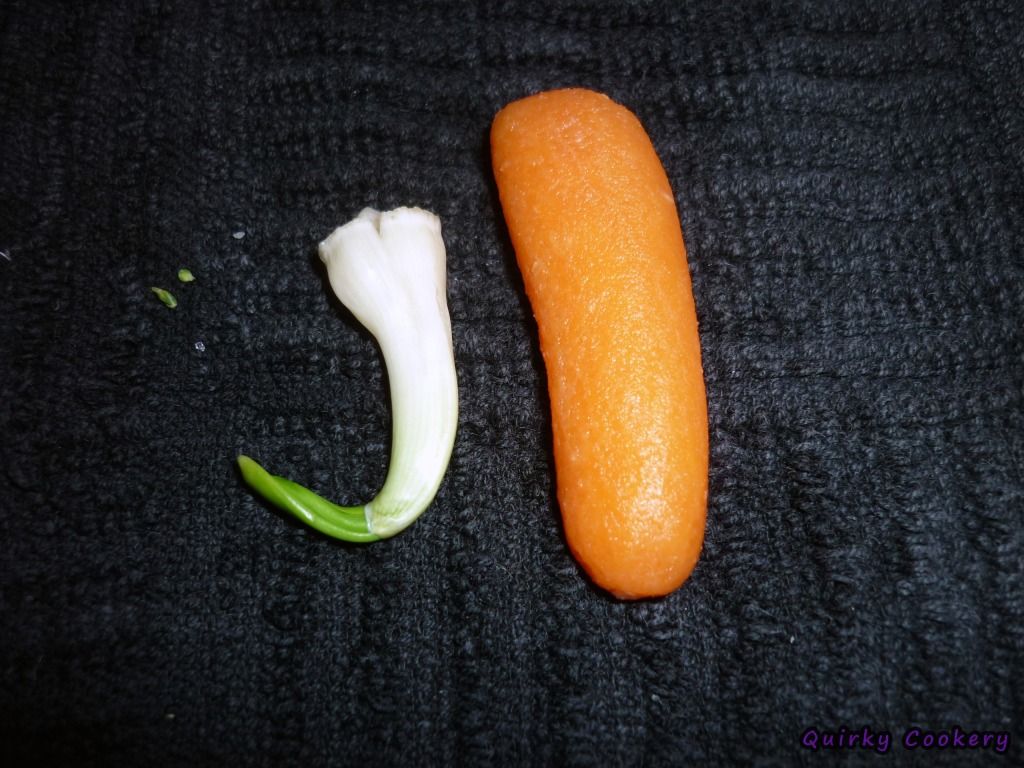Garlic sprout as big as a baby carrot