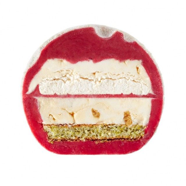 Ice moon from Haagen Dass - white moon consists of a pistachio biscuit base, layers of macadamia nut ice cream and meringue and a coating of raspberry ice cream