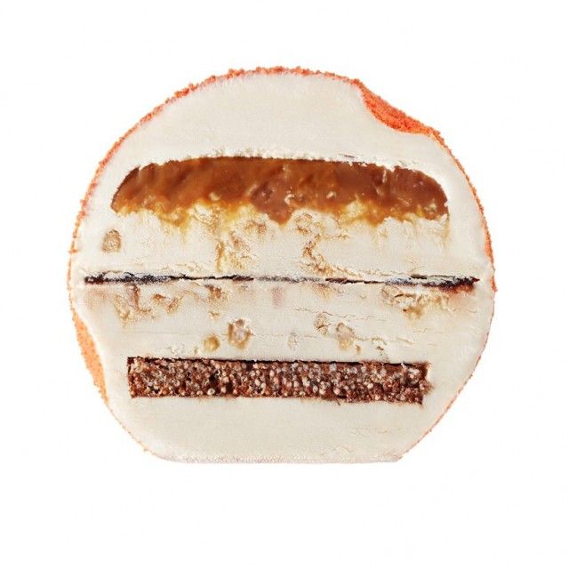 Ice moon from haagen dazs - orange moon has crunchy chocolate at the bottom, layers of nutty ice cream and salted caramel and a coating of vanilla ice cream