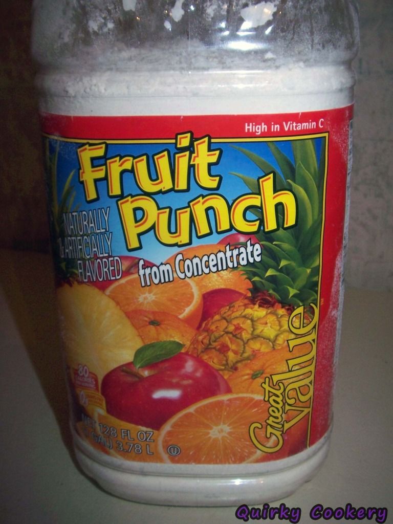 Large fruit punch jug reused to hold pantry goods like homemade pancake mix