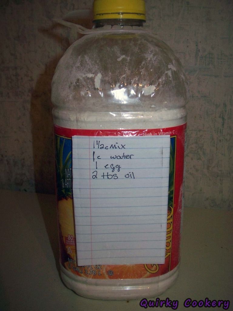Homemade pancake mix stored in large jug with instructions recipe