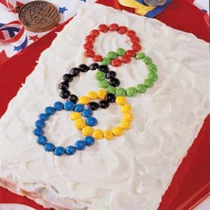 Cake with  blue, black, red, yellow, green M&Ms candies to look like Olympic rings