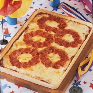 Pizza with pepperoni circles to look like Olympic rings