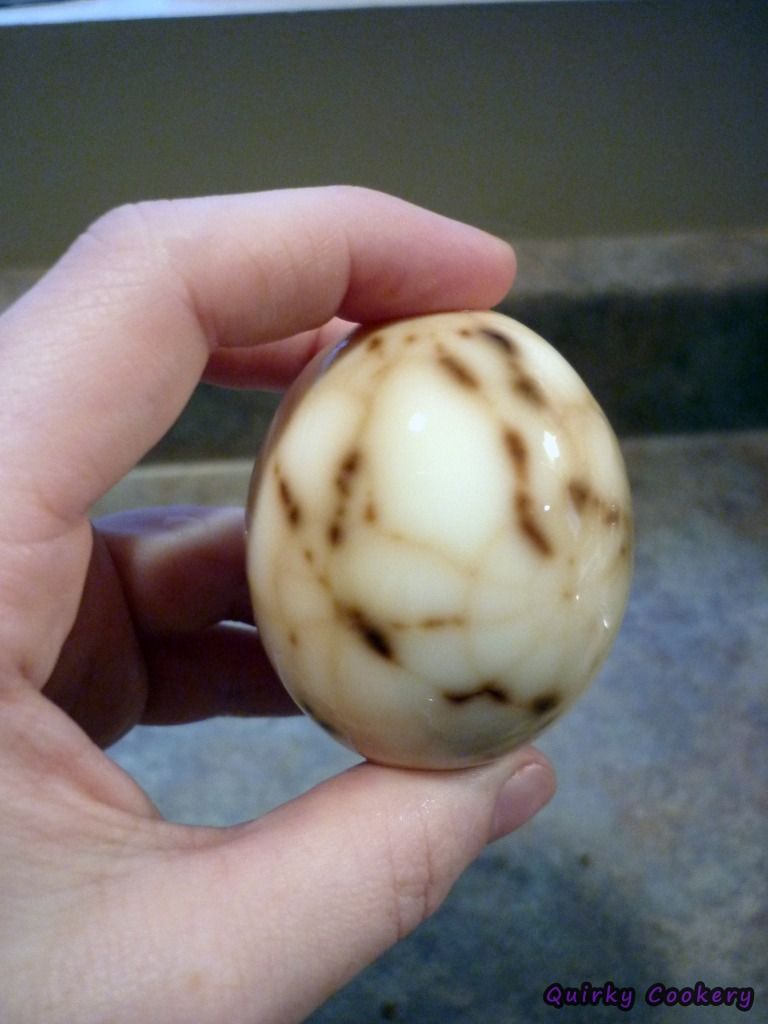 Marbled tea eggs with dark spotty lines and dots