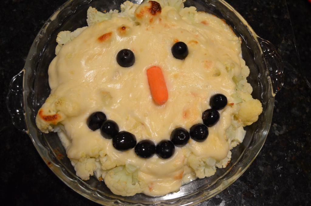 Cauliflower casserole with olives and carrots
