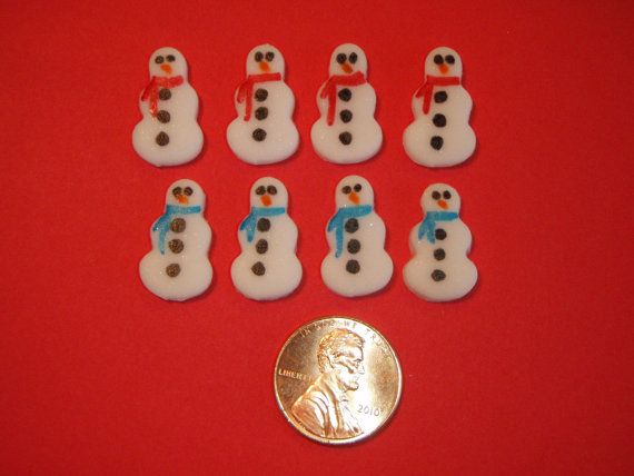 Miniature snowmen made out of fondant