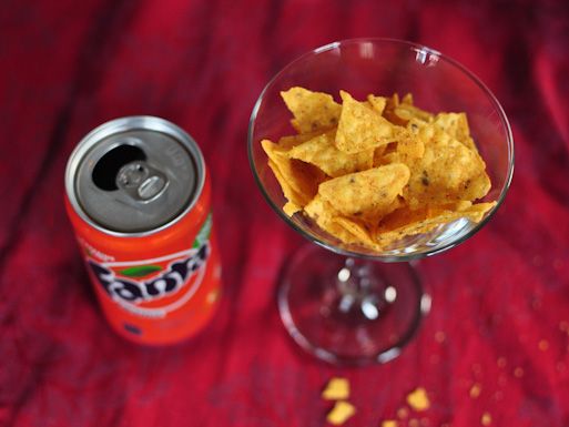 Fanta paired with cool ranch doritos with the chips in a martini glass