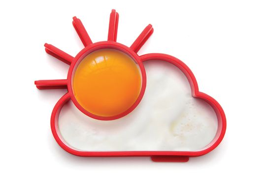 Sunnyside up egg shaper that is a heat-resistant cookie cutter made of silicone to make eggs look like sunshine with clouds behind it