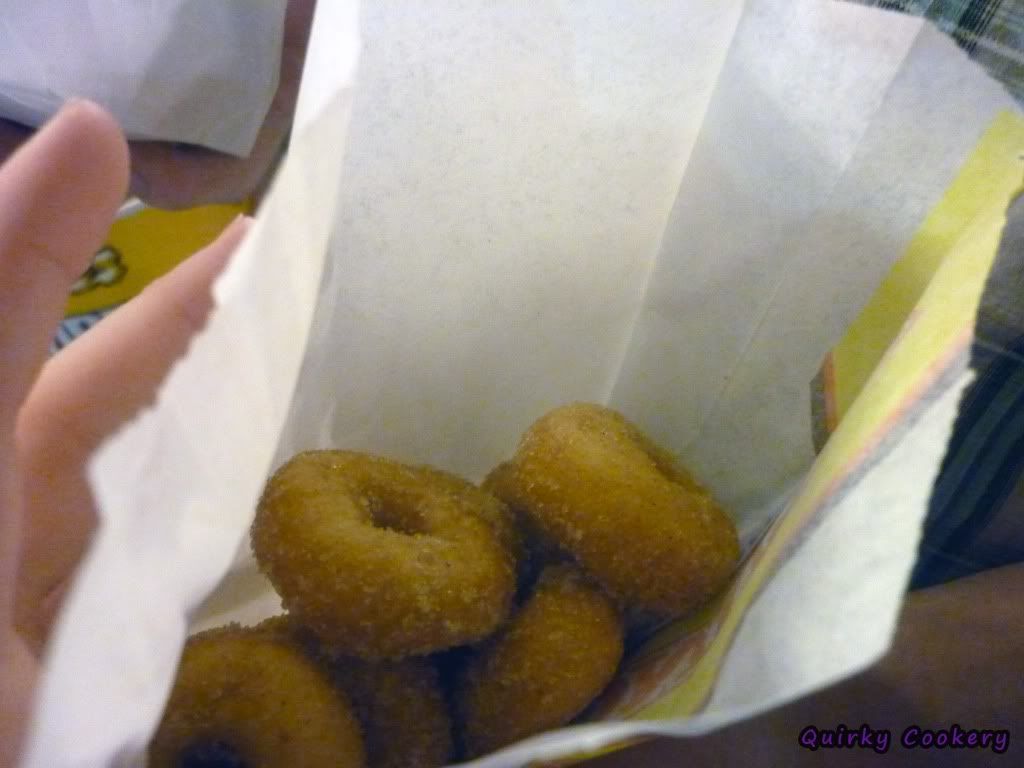 Mini doughnuts from Those Little Donuts dipped in sugar and cinnamon