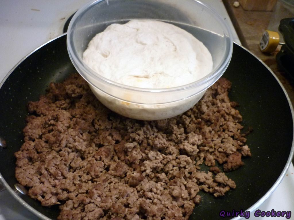 Browned ground beef, pork, or turkey plus a bowl of bread down that has been left to rise