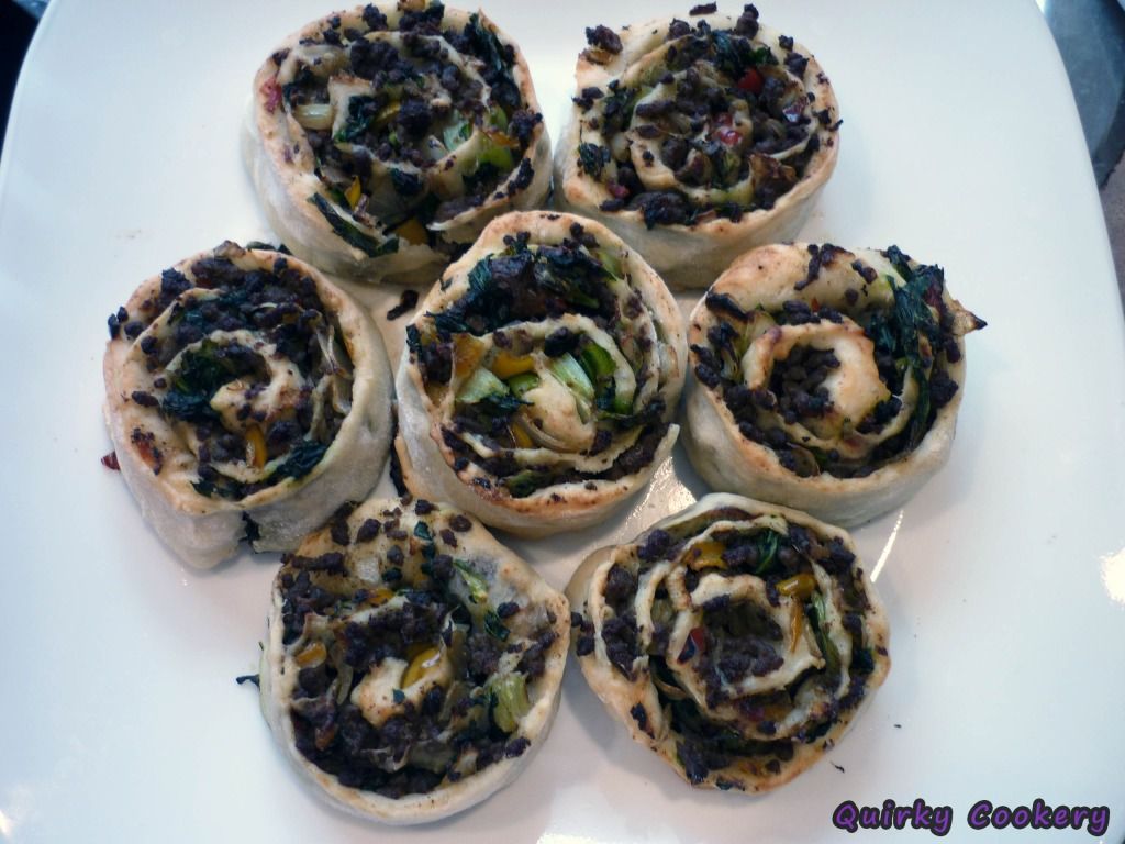 Cooked beef or pork rolls with wilted lettuce, onions, peppers, and then sliced into rolls for dinner