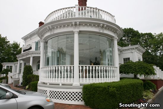 Glassed in veranda dining area in McDonald's that's been put in historic restored mansion in Long Island New York