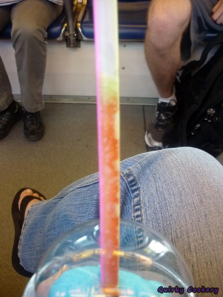 Drinking a Slurpee on Skytrain in Vancouver, Canada with blue raspberry, coca cola, and other flavor combinations
