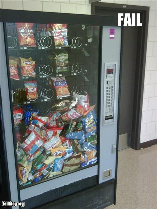 Vending machine fail with all the chips piled up in front. 