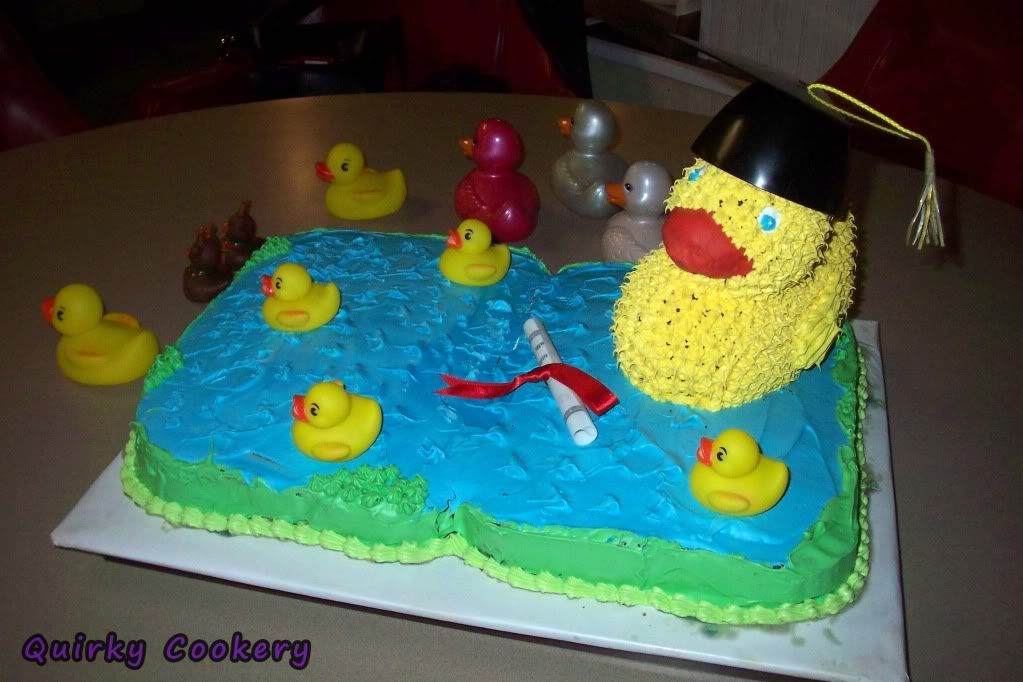 Graduation duck cake with rubber ducky decorations