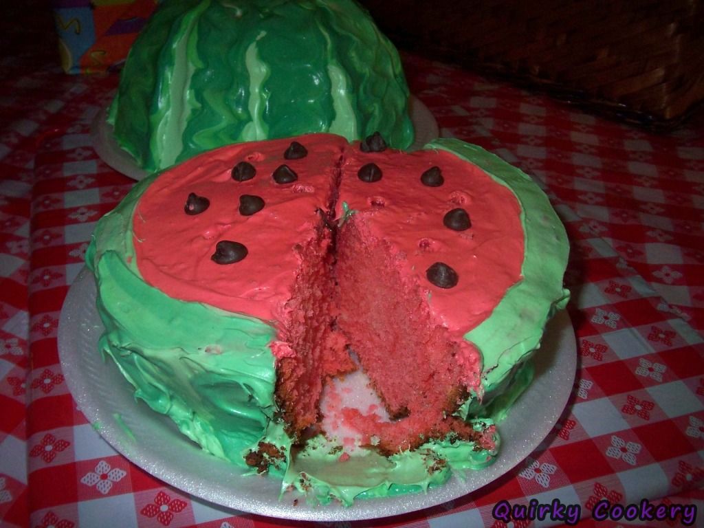 Watermelon cake with red inside and chocolate chip seeds