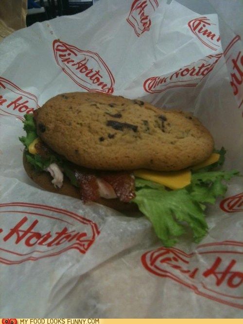 Canadian Tim Hortons sandwich made of a chocolate chip cookie with bacon, lettuce, tomato, instead of bread and bagels because they were out